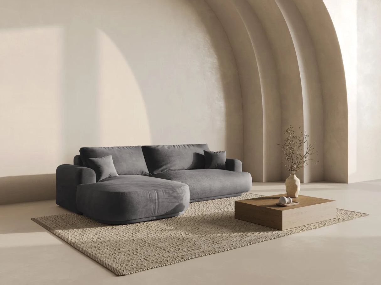 Ella 4-Sitzer Ecksofa Links mit Schlaffunktion und Bettkasten mit Bezug aus Samt (Vog15) in Grau, 271x174 cm – Bild 1