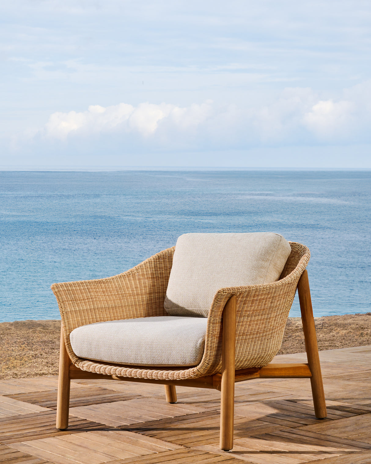 Sessel Galea aus massivem Teakholz und synthetischem Rattan FSC 100%