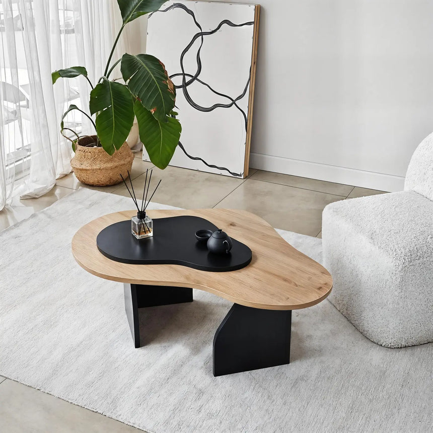Couchtisch Melted aus melaminbeschichteten Holz in Saphir-Eiche und Schwarz, 105×65×35 cm von Hanah Home – Bild 1