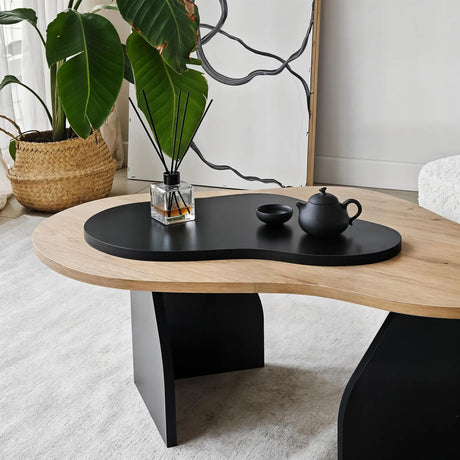 Couchtisch Melted aus melaminbeschichteten Holz in Saphir-Eiche und Schwarz, 105×65×35 cm von Hanah Home – Bild 6