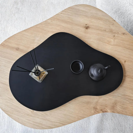 Couchtisch Melted aus melaminbeschichteten Holz in Saphir-Eiche und Schwarz, 105×65×35 cm von Hanah Home – Bild 8