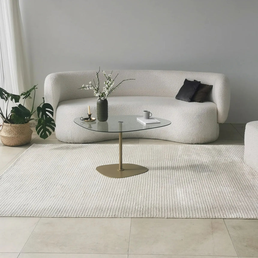 Couchtisch Soho aus gehärtetem Glas und Metall in Transparent und Gold, 85×67×40 cm von Hanah Home – Bild 1