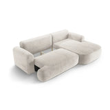 Canapé d'angle droit Ella 4 places avec fonction couchage et coffre de rangement. Revêtement en velours, tissu structuré ou bouclé, 271 x 174 cm.