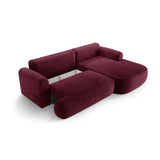 Canapé d'angle droit Ella 4 places avec fonction couchage et coffre de rangement. Revêtement en velours, tissu structuré ou bouclé, 271 x 174 cm.